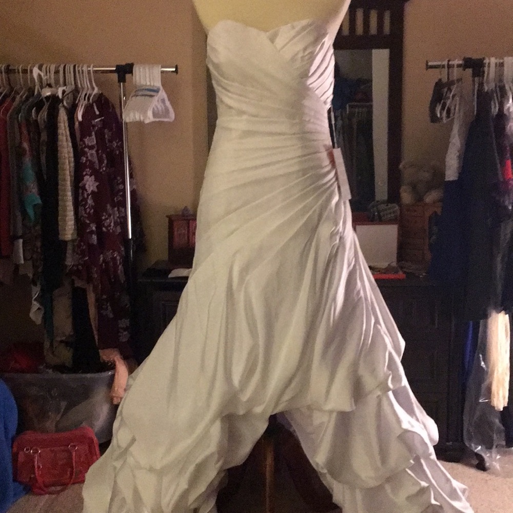 Asymmetrical Wedding Dress; never worn w/ tags on.